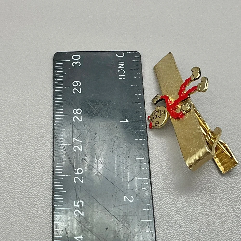 Vintage Reddy Kilowatt Tie Clip Gold Tone Textured Bar Advertising Novelty